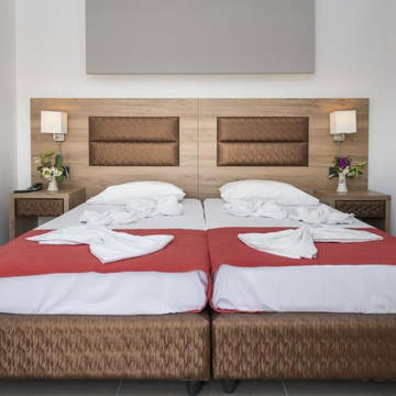 Voorbeeld slaapkamer Hotel Porto Plazza