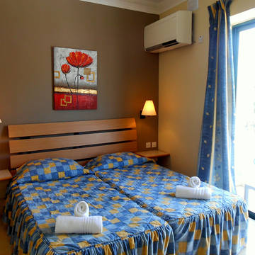 Voorbeeld kamer Porto Azzurro Aparthotel